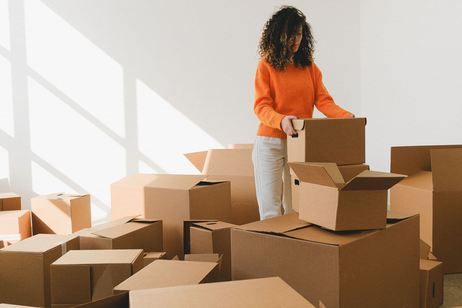Team member preparing boxes for a move